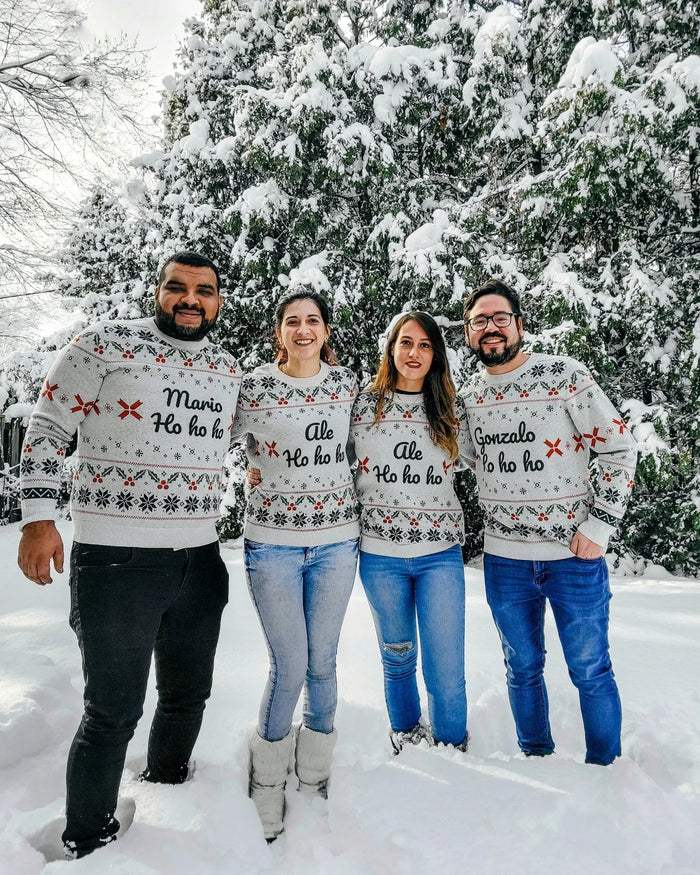 Group of people wearing custom ugly Christmas sweaters made with Knitwise Knit On Demand  technology.