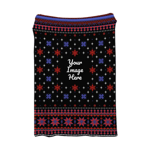 Black Christmas blanket with red, blue, and white snowflakes