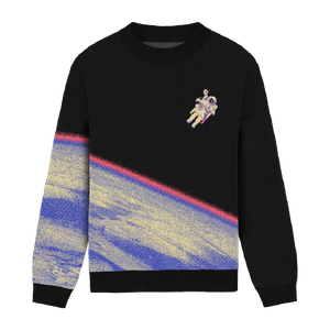Black sweater with astronaut above Earth design, bold and space-themed
