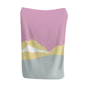 Pastel mountain blanket in pink, yellow, white, and grey