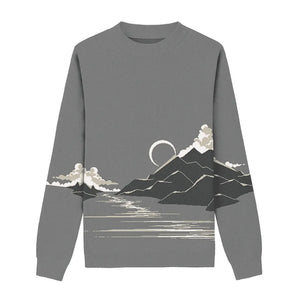 Sweater with a flat design mountain and beach scene in black, grey, and white.