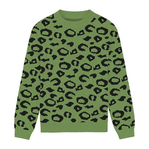 Green relaxed-fit sweater with black leopard spots, bold and artistic