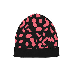 Black beanie with vibrant pink leopard spots, playful and edgy