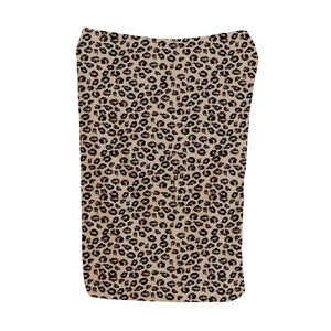 Cream leopard blanket with black spots and orange accents