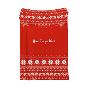 Red Christmas blanket with white snowflakes and ribbon details