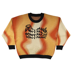 Sweater with 'DON'T PANIC' text on a white background